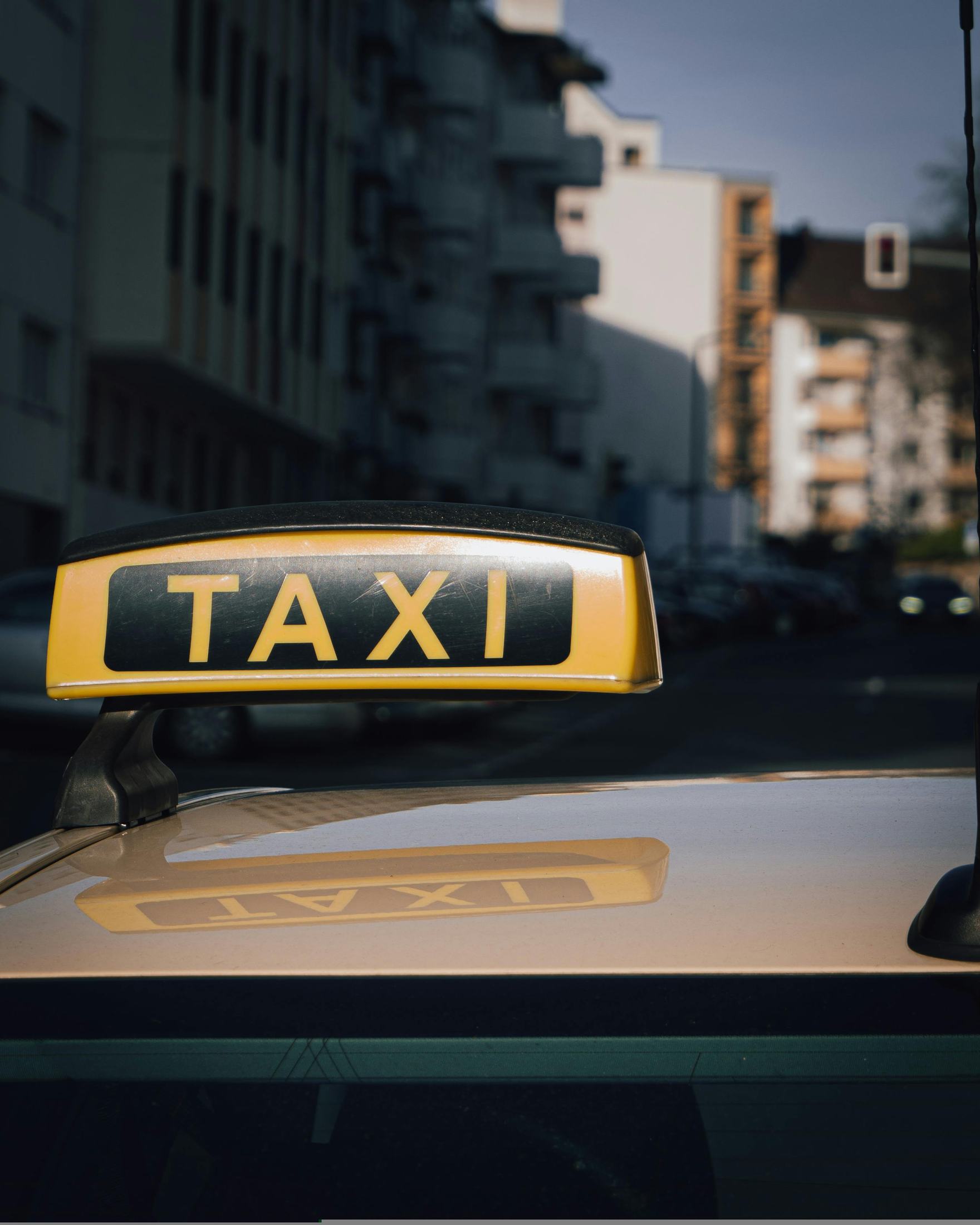 Taxi sign ready for a pre-booked Handei scheduled ride.